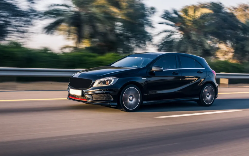 Black luxury jeep driving highway